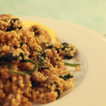 Vegetarian couscous with mushrooms and spinach.